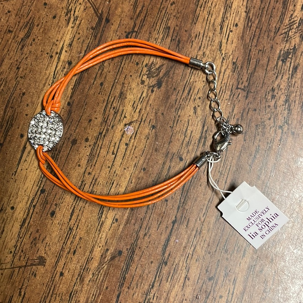 Lia Sophia silver pave crystal and dark orange bracelet